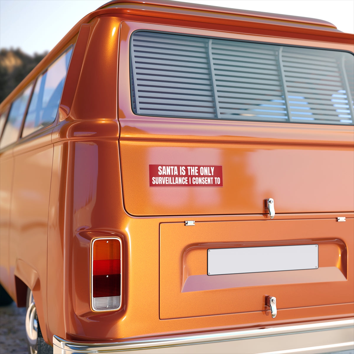 Santa Is the Only Surveillance I Consent To Bumper Sticker - on the rear panel of a van, shown at true 11" x 3" scale